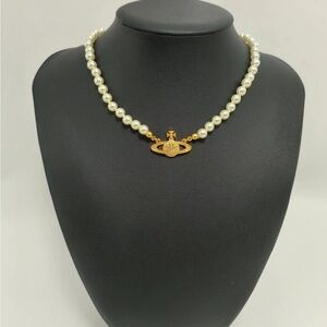 Vivienne Westwood Pearl Necklace with Gold Mini Saturn Pendant